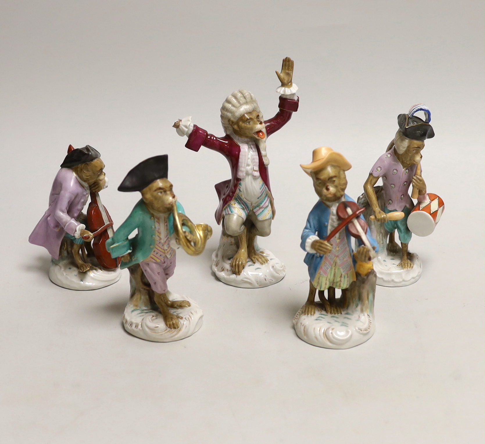 Five Volkstedt porcelain monkey band figures, tallest 17cm